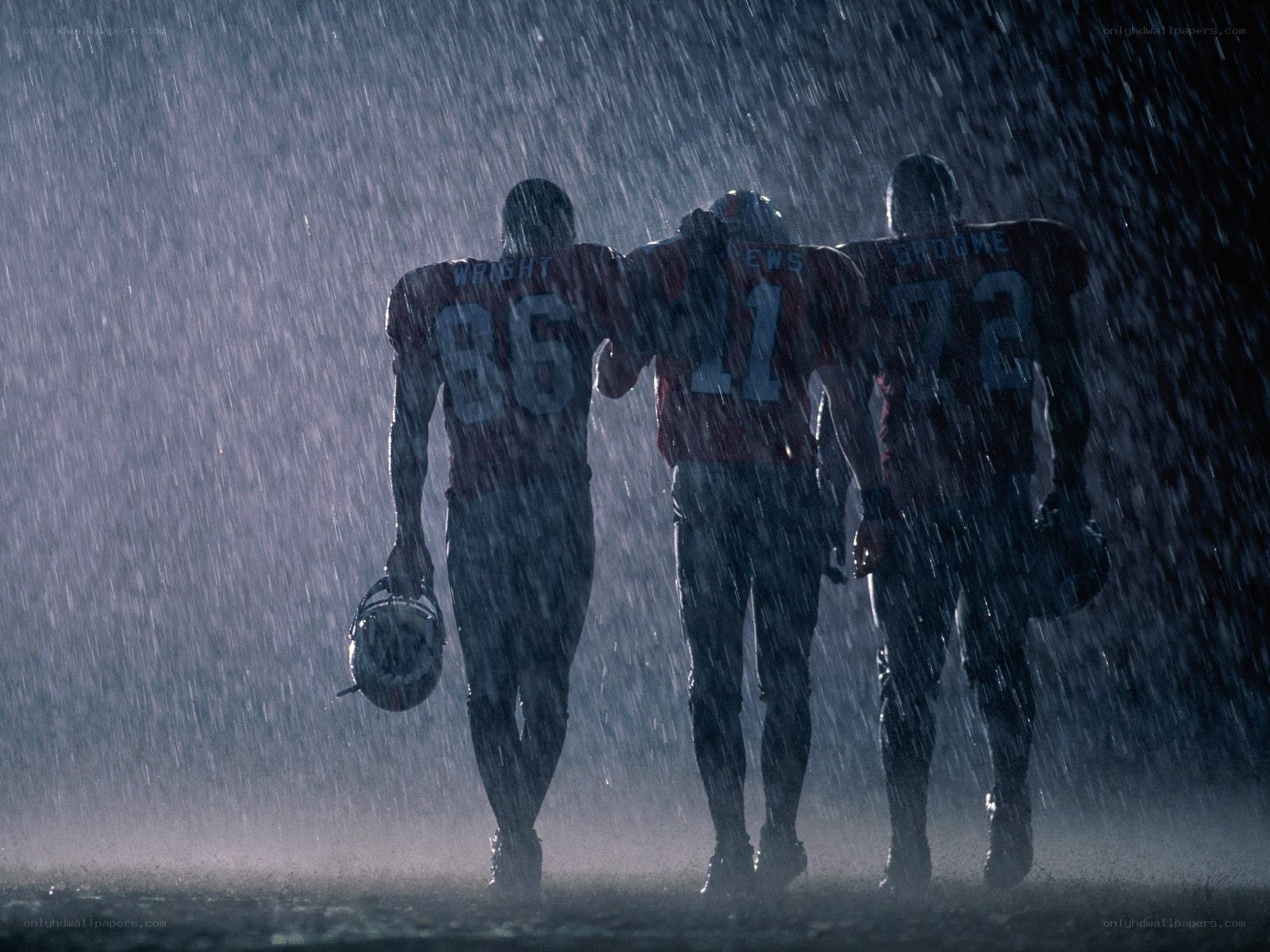 Football players in rain