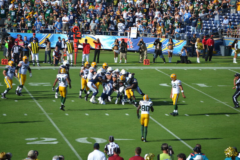 Football Players on Field — Green, Active