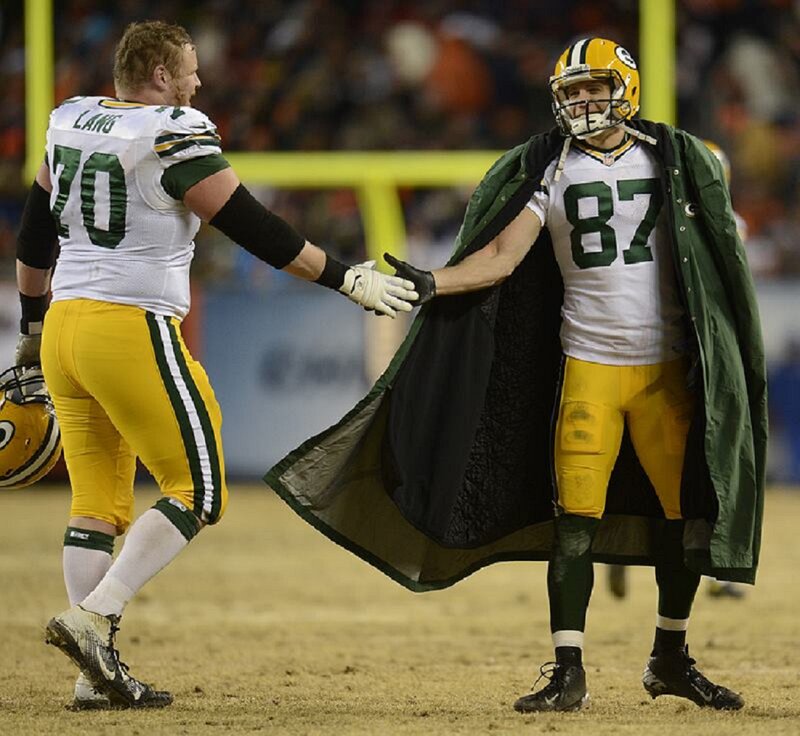 Football Players on Field — Green, Competitive