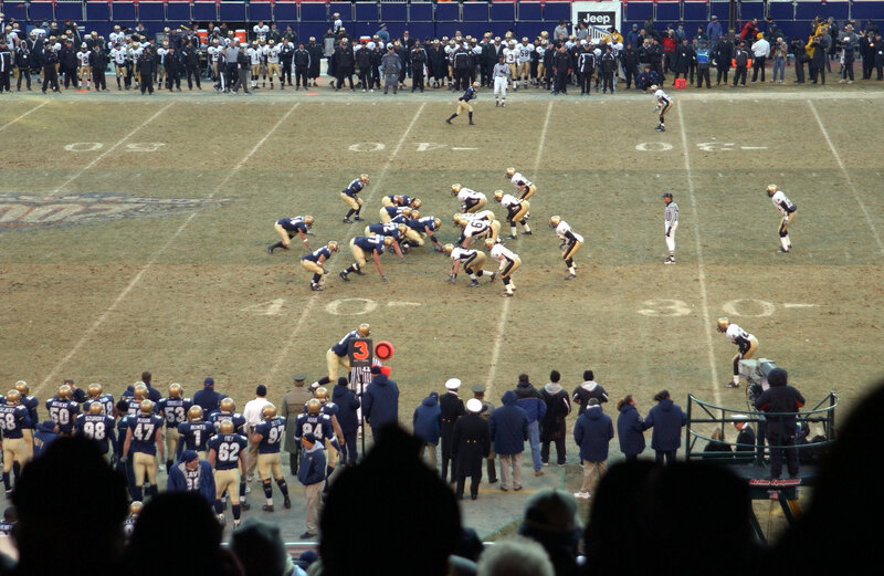 Football Players on Field — Green