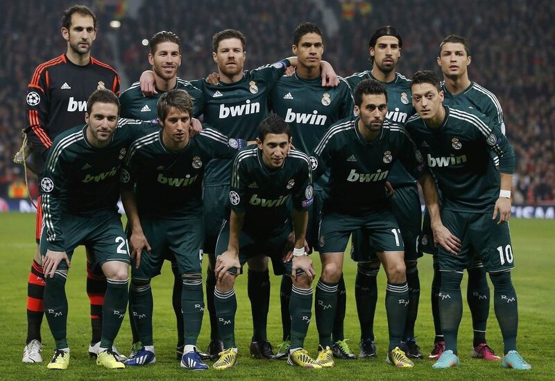 Football Players Posing — Green, Serious, Night, Photograph