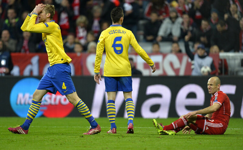Football players reacting to a goal