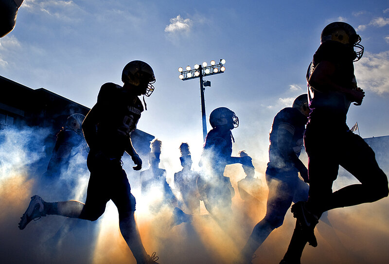 Football Players Running