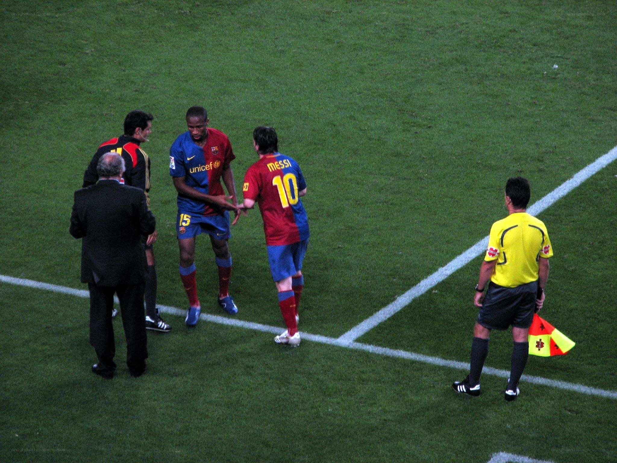 Football players shaking hands