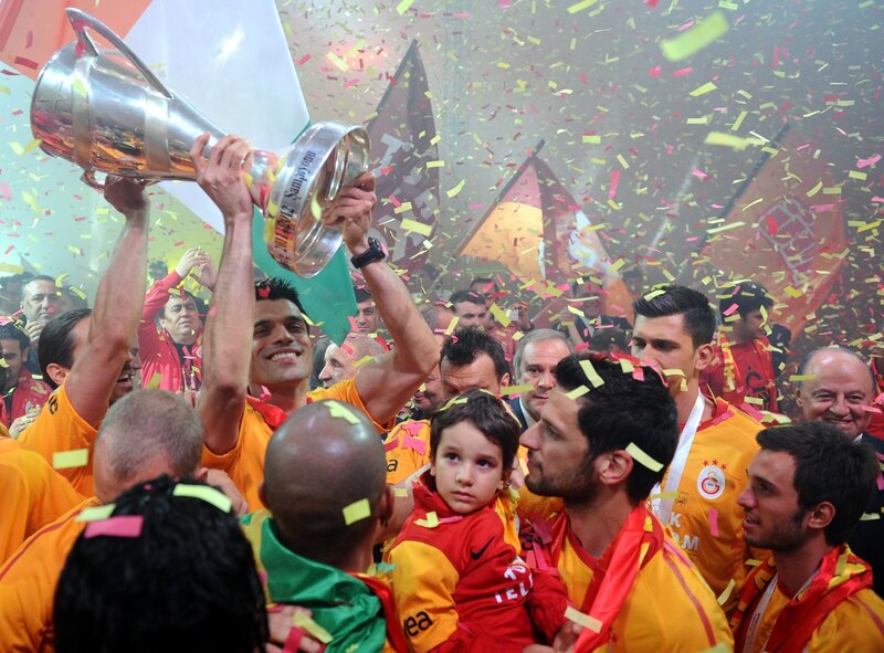Football team celebrates trophy win