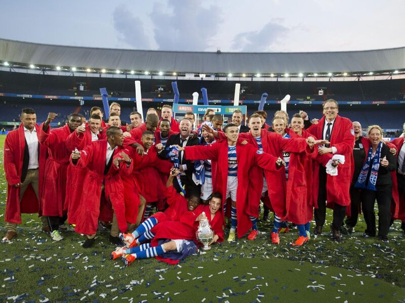 Football Team Celebrating — Red