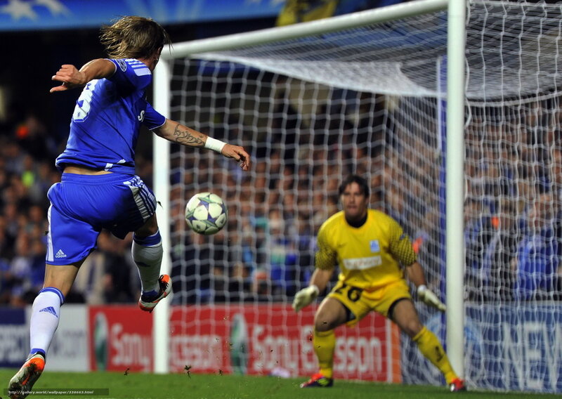 footballer scoring goal