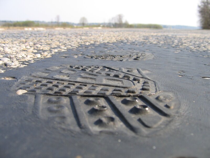 footprint impressions on pavement