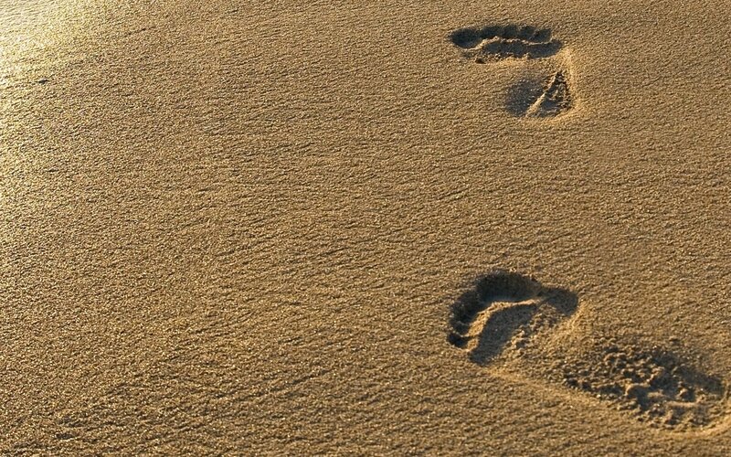 Footprints in Sand — Serene