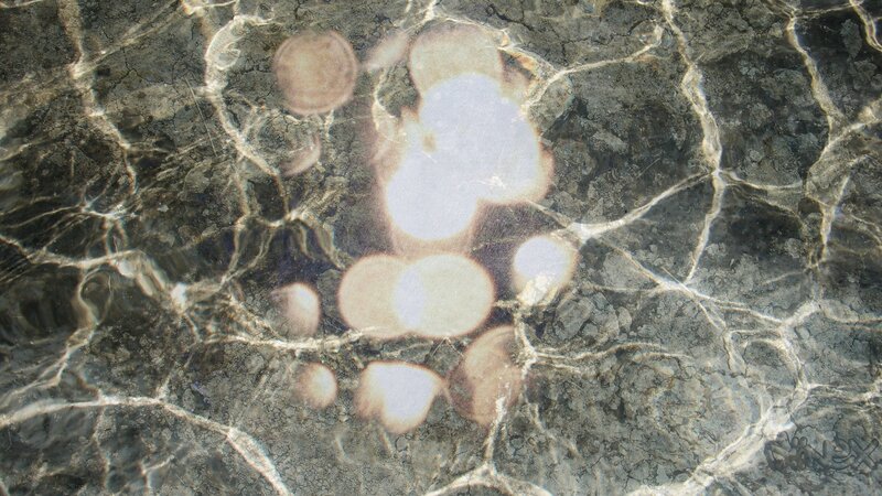 Footprints in shallow water
