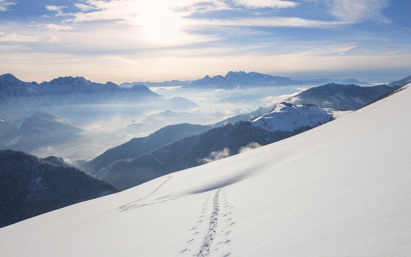 Footprints in Snow — White, Serene, Winter, Photograph, Mountains, Clouds