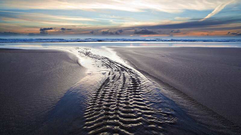 Footprints in Wet Sand — Blue