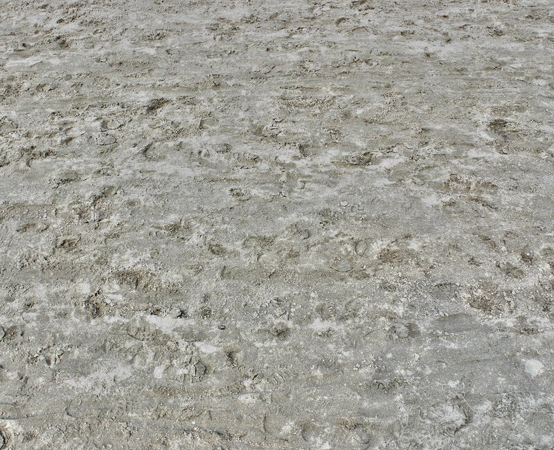 footprints in wet sand