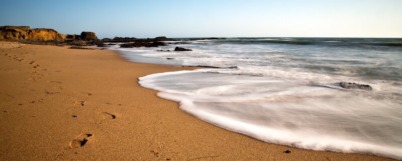 Footprints on a sandy beach