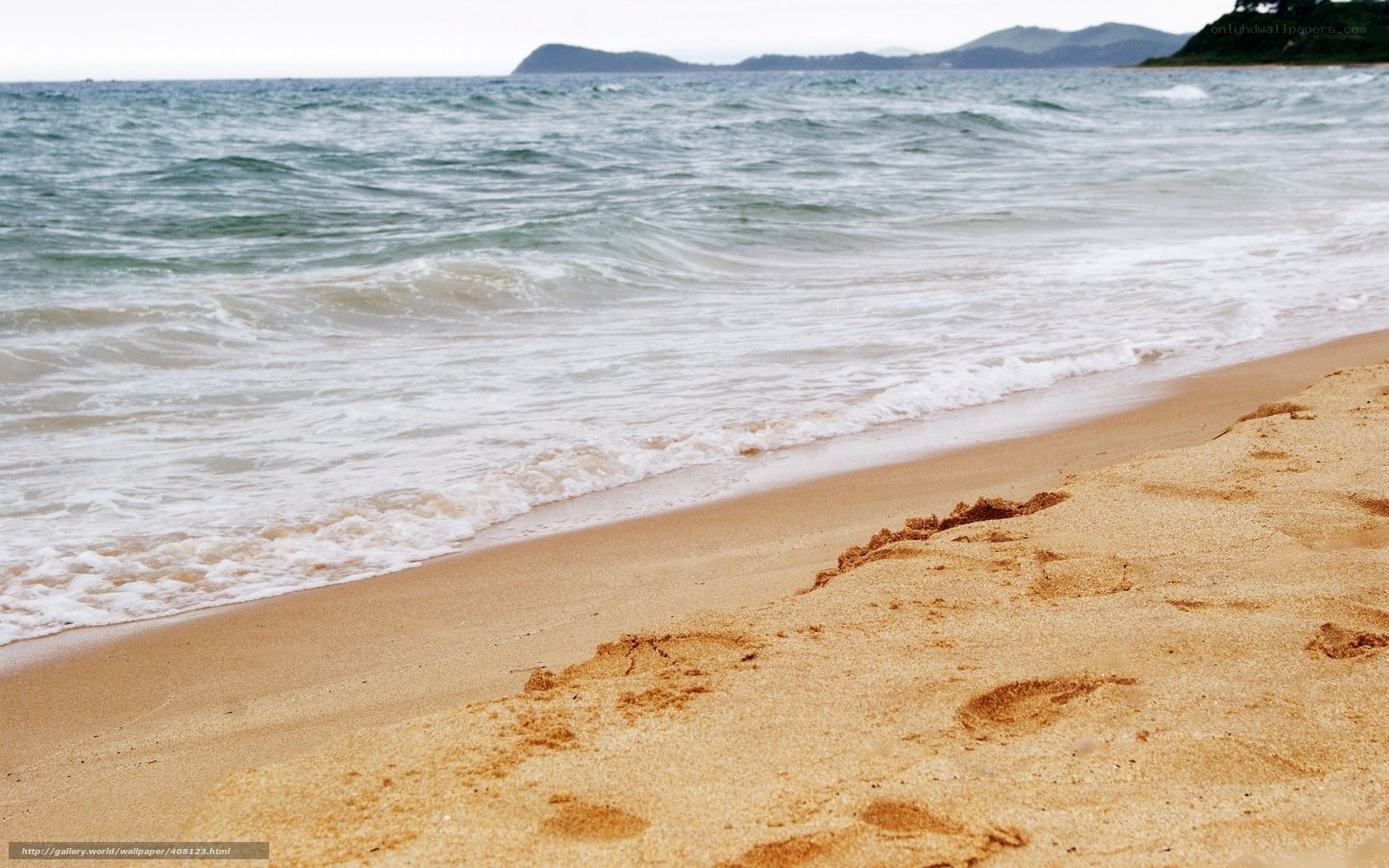 Footprints on a sandy beach