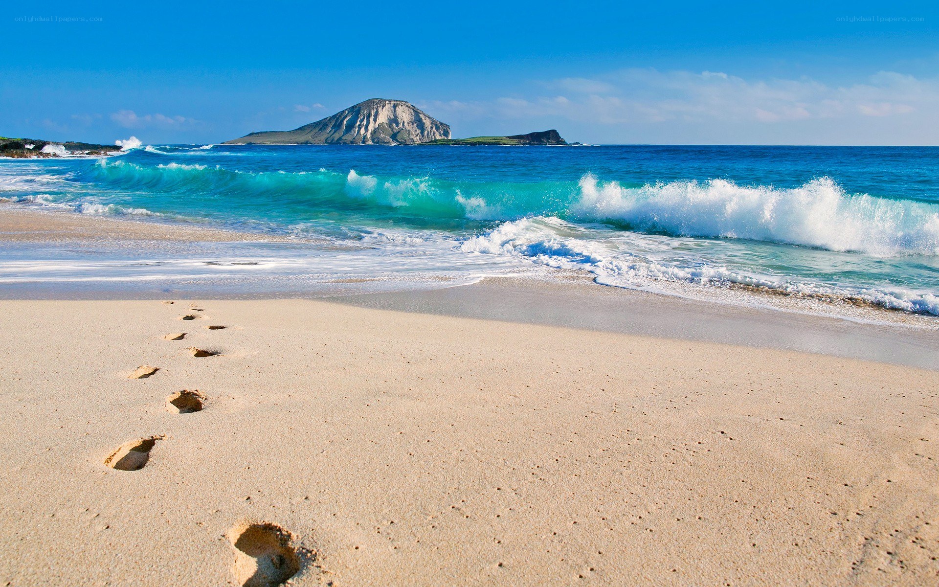 Footprints on a tropical beach