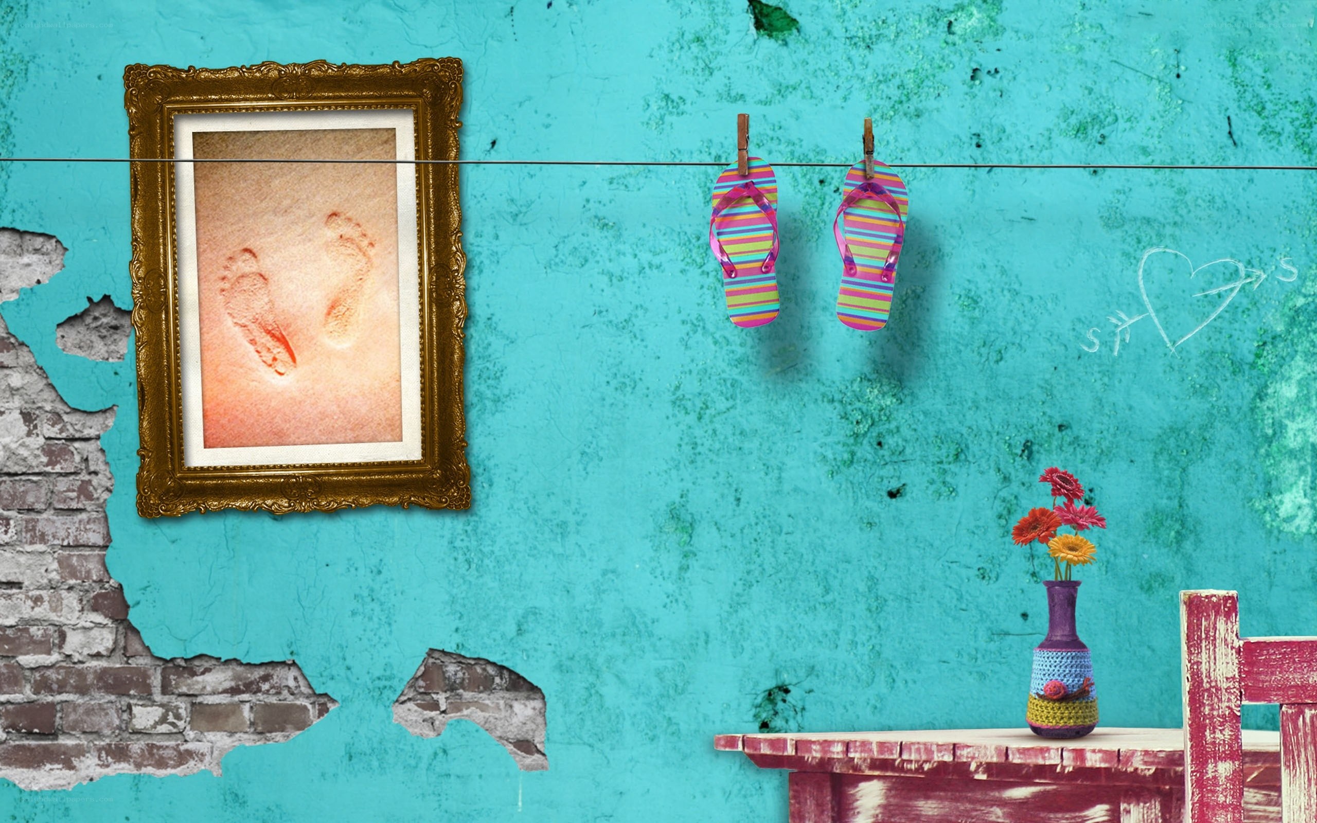 Footprints on a turquoise wall