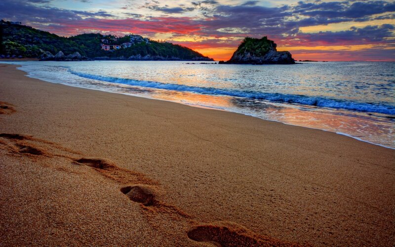 Footprints on Beach — Orange, Serene, Sunset, Photograph