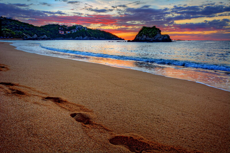Footprints on Beach — Orange, Serene, Sunset