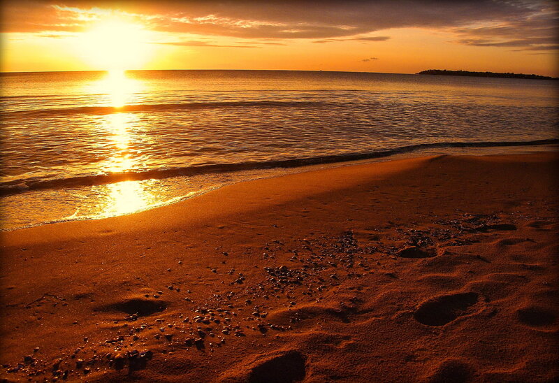 Footprints on Beach — Orange