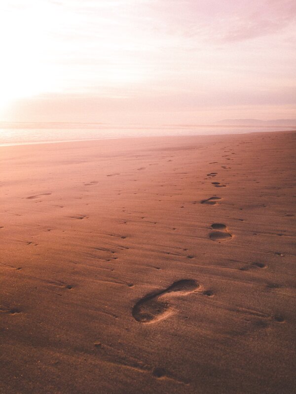 Footprints on Beach — Pink