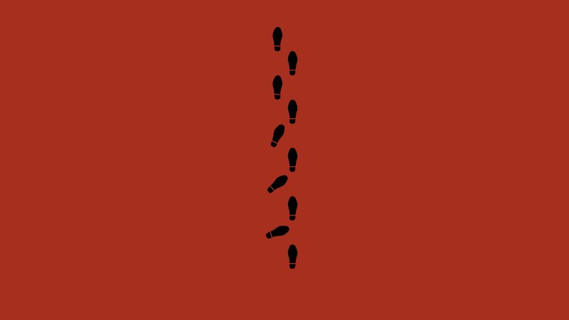 Footprints on Red Surface