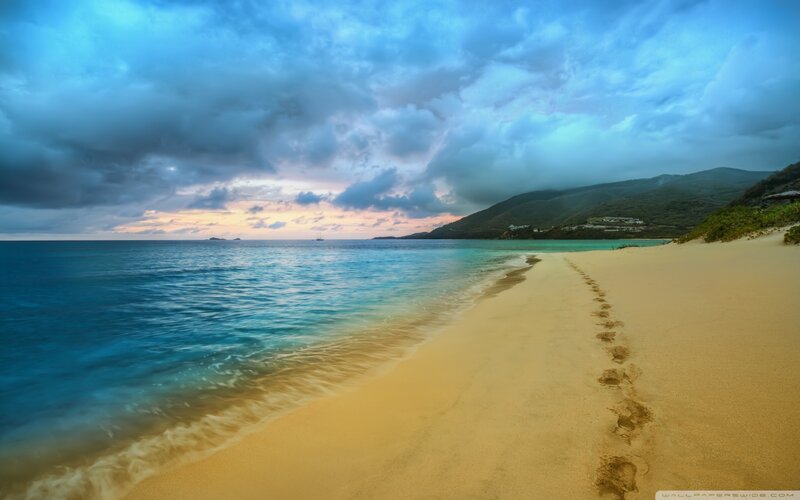 Footprints on Sandy Beach — Blue, Dramatic, Sunset