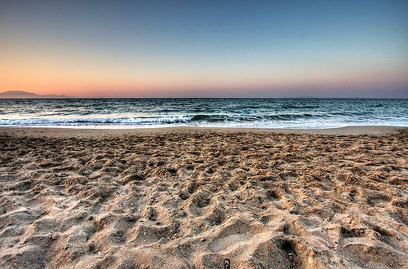 Footprints on Sandy Beach — Blue, Serene