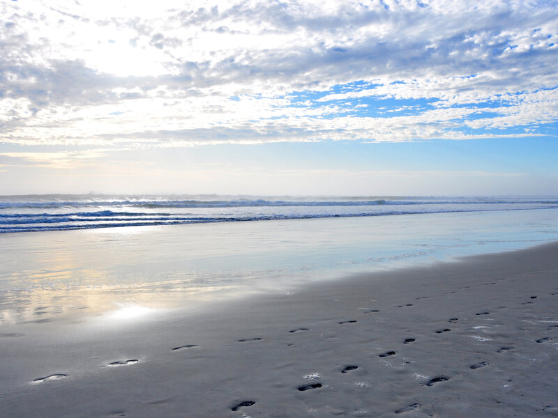 Footprints on Wet Sand — Blue