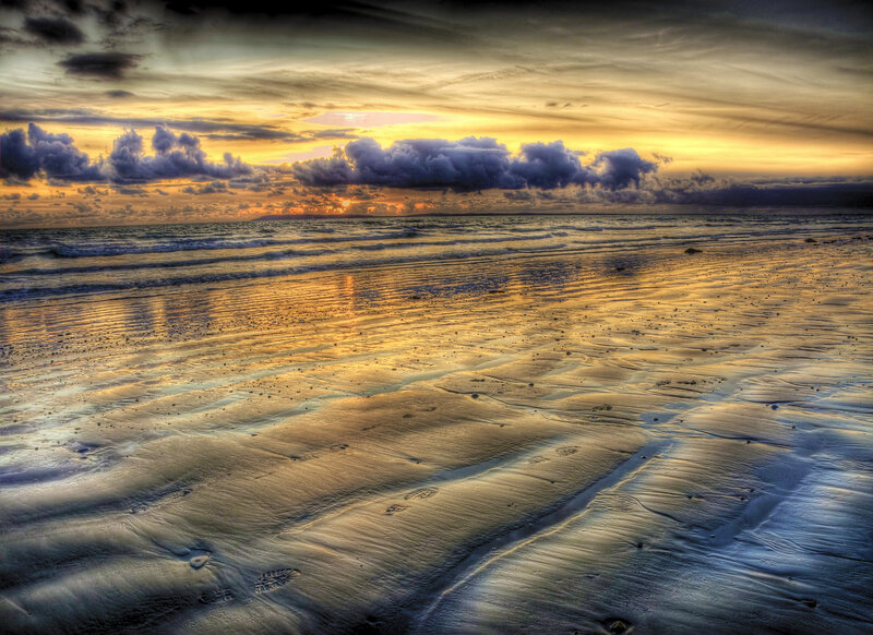 Footprints on Wet Sand