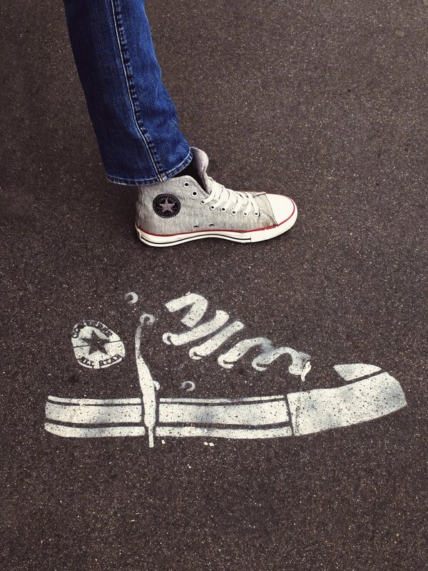 footwear art on pavement