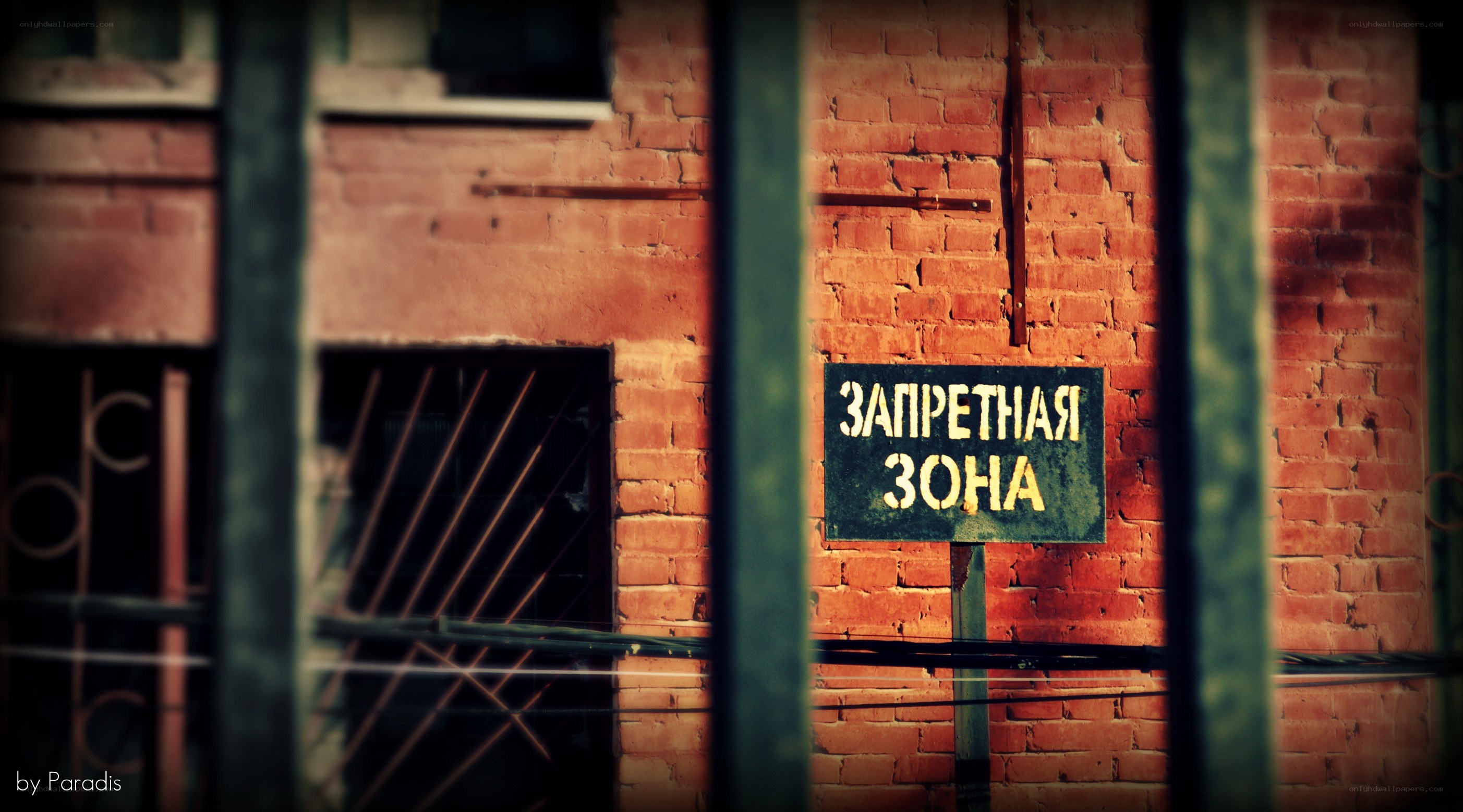 Forbidden Zone sign on brick wall