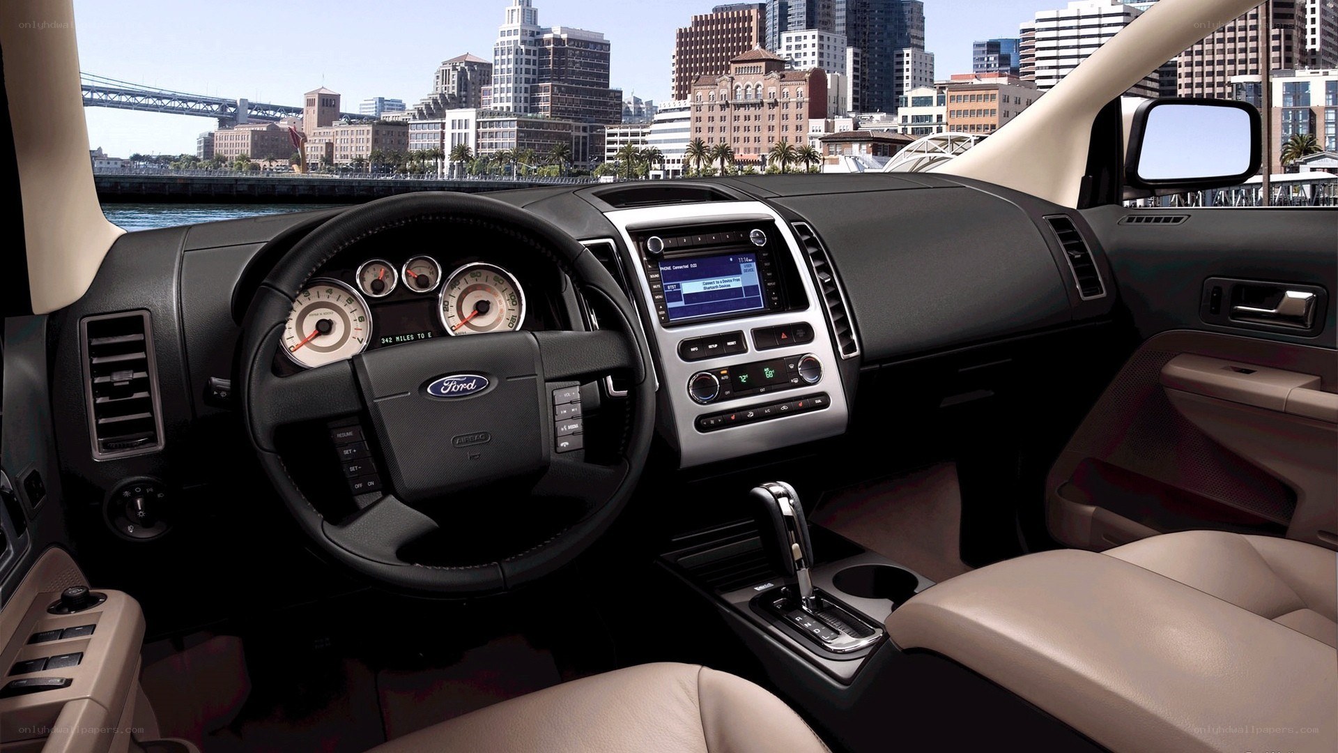 Ford car interior with city view
