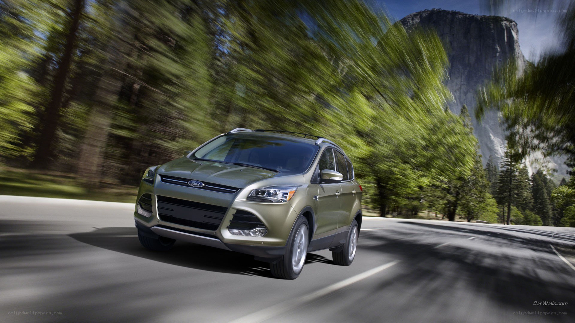 Ford Escape driving on a road