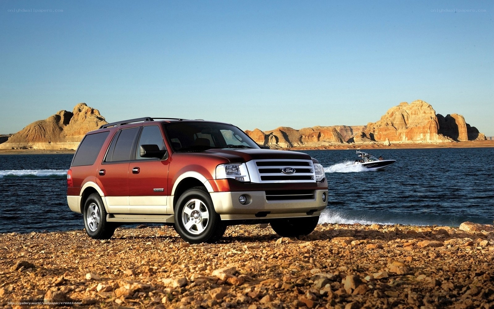 Ford Expedition by a lake