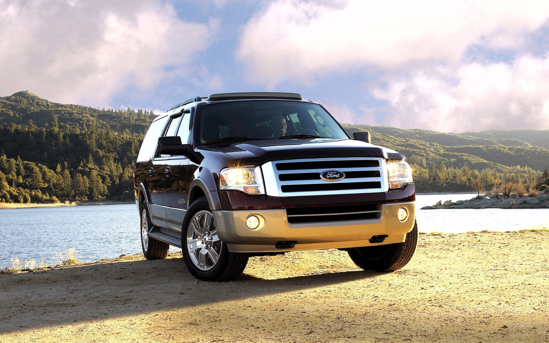 Ford Expedition by a lake