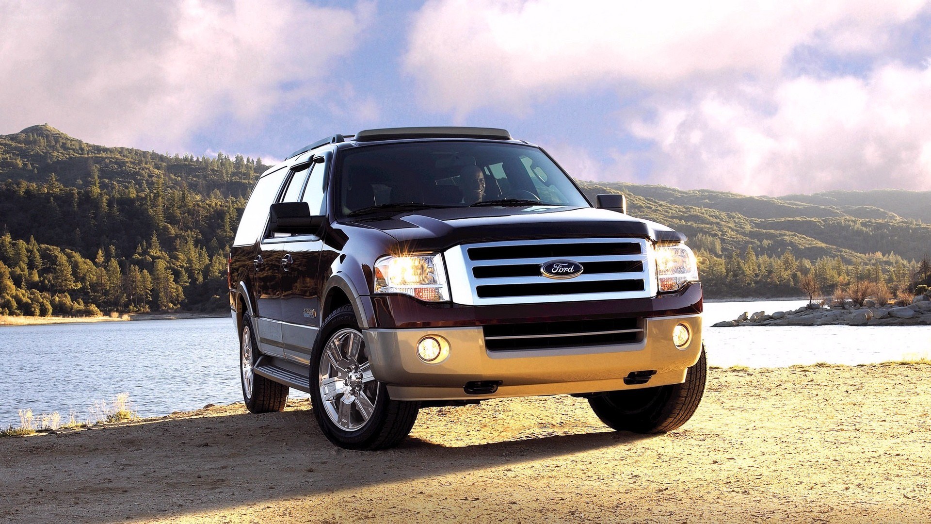 Ford Expedition by a lake