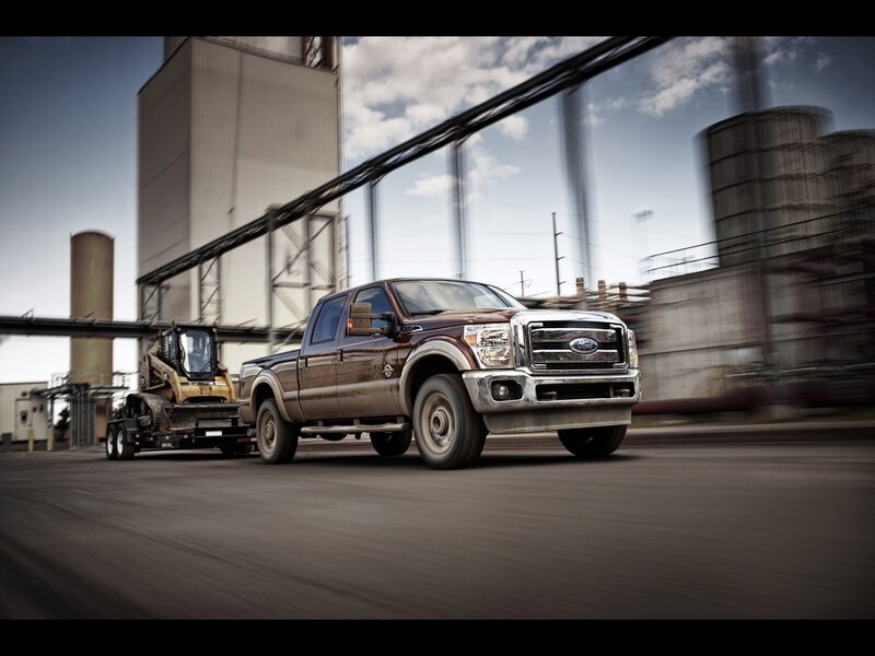Ford F-250 towing construction equipment
