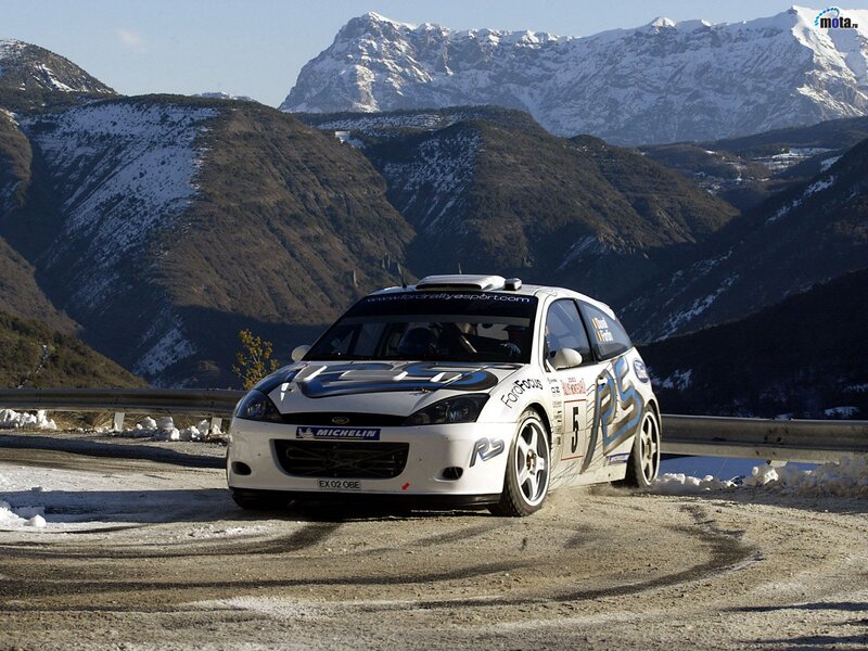 Ford Focus rally car on mountain road