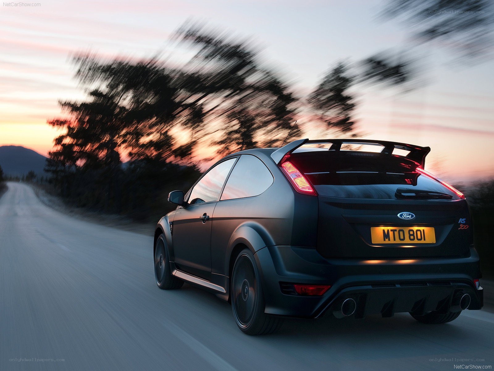 Ford Focus RS driving at dusk