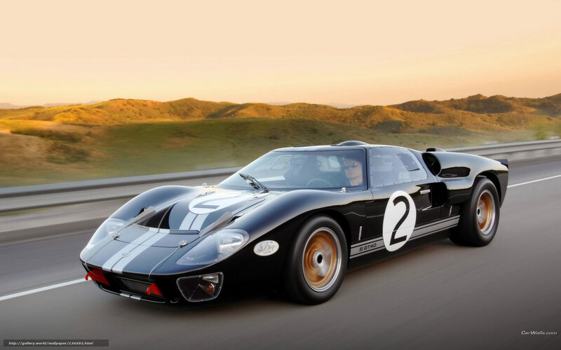 Ford GT40 racing on a road