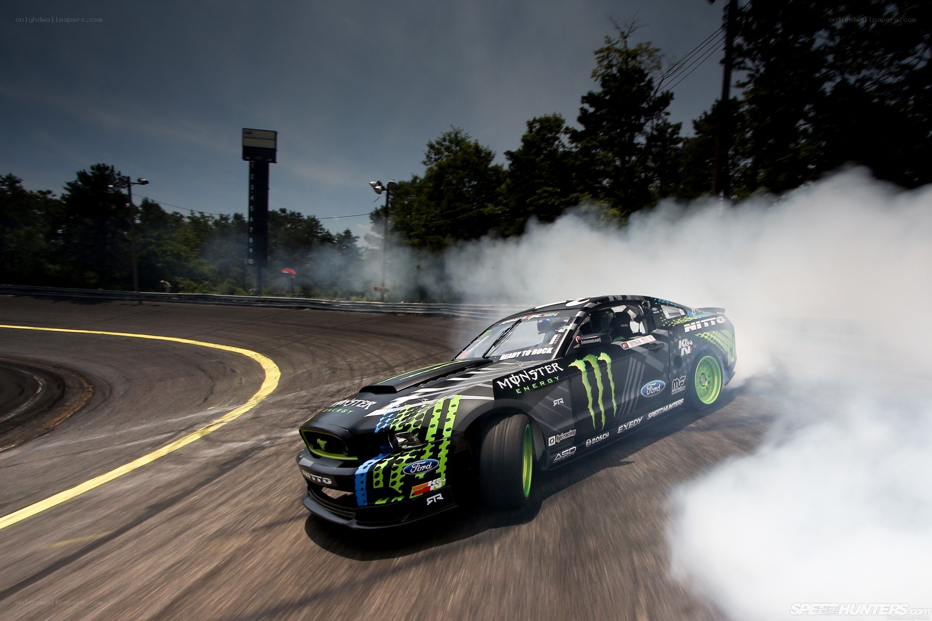 Ford Mustang drifting on track