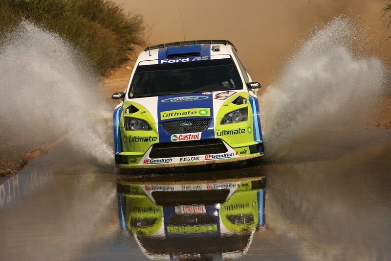 Ford rally car in water splash