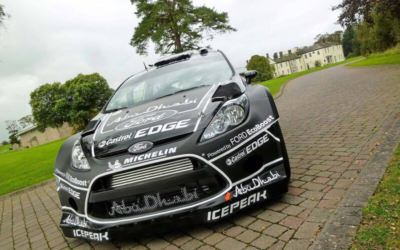 Ford rally car on a driveway