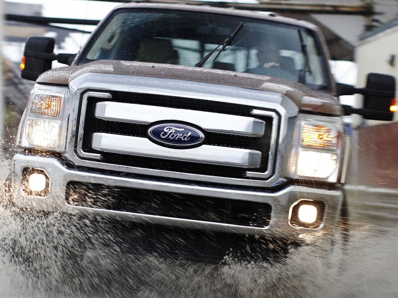Ford truck driving through water