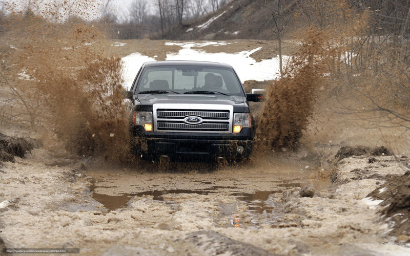 Ford truck in muddy terrain