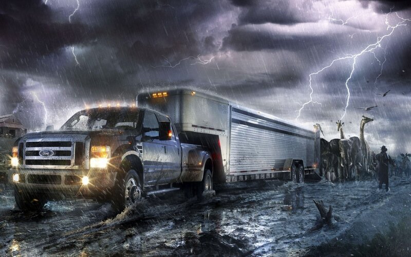 Ford truck in storm with animals