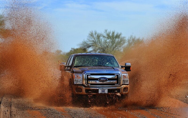 Ford truck splashing mud