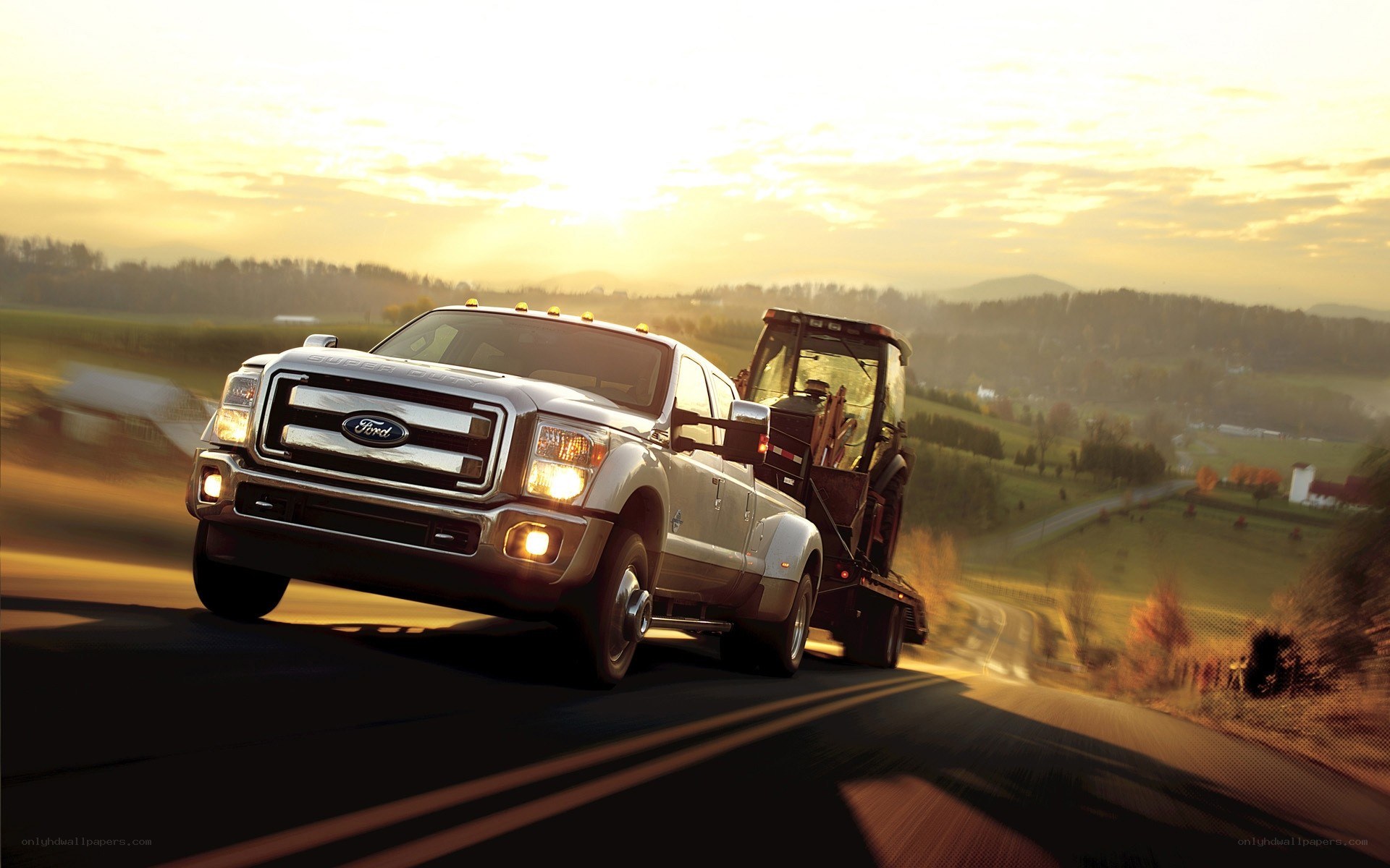 Ford truck towing tractor