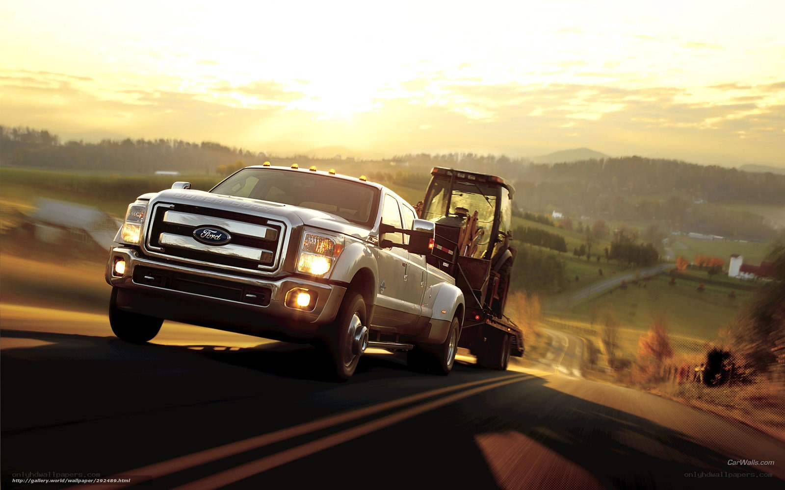 Ford truck towing tractor